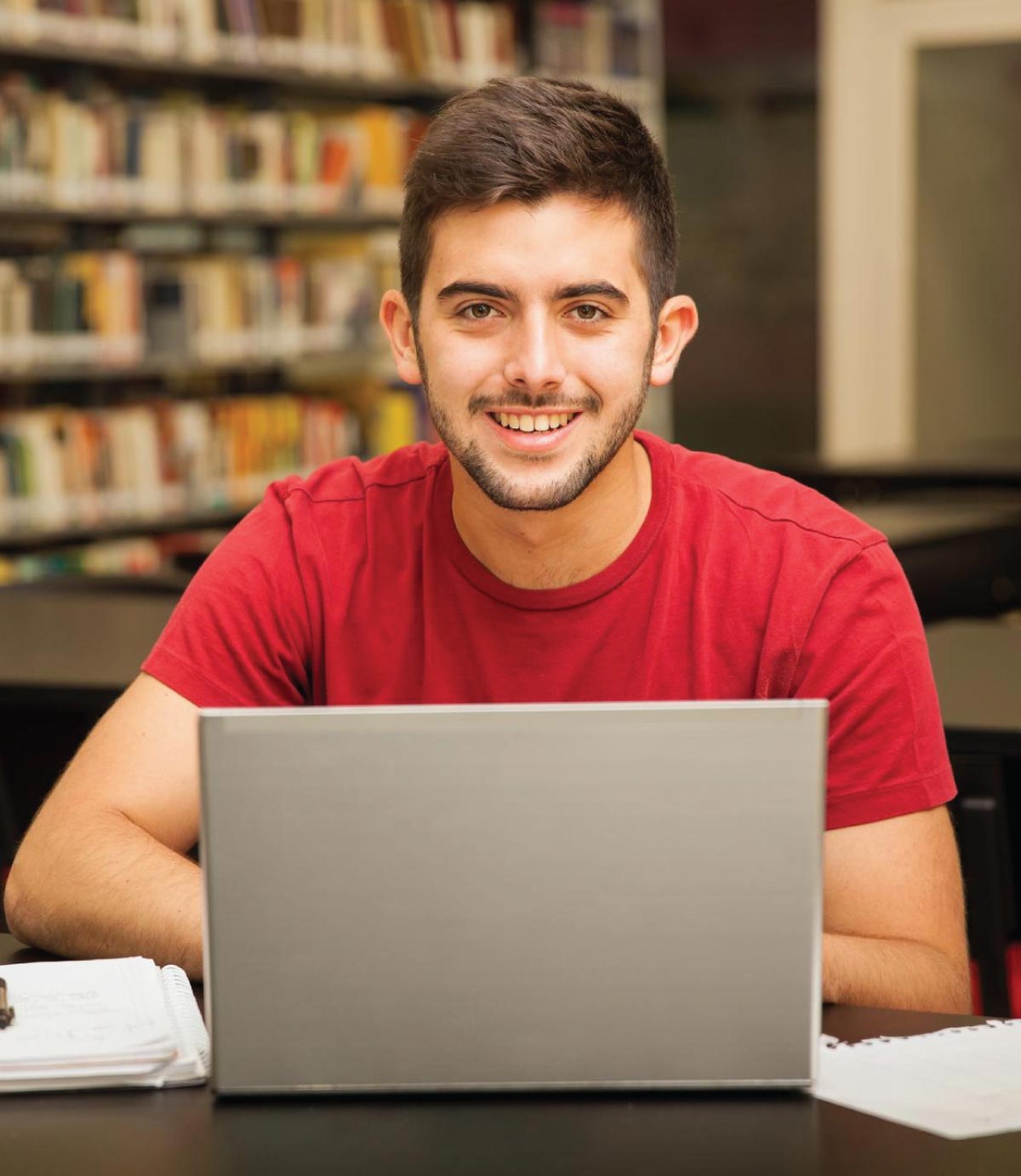 Learner studying in a library